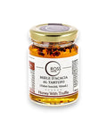 Jar of acacia honey with white truffles for a gourmet culinary experience