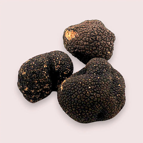 Three black truffles.